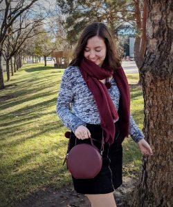 maroon trendy circle purse with pom poms