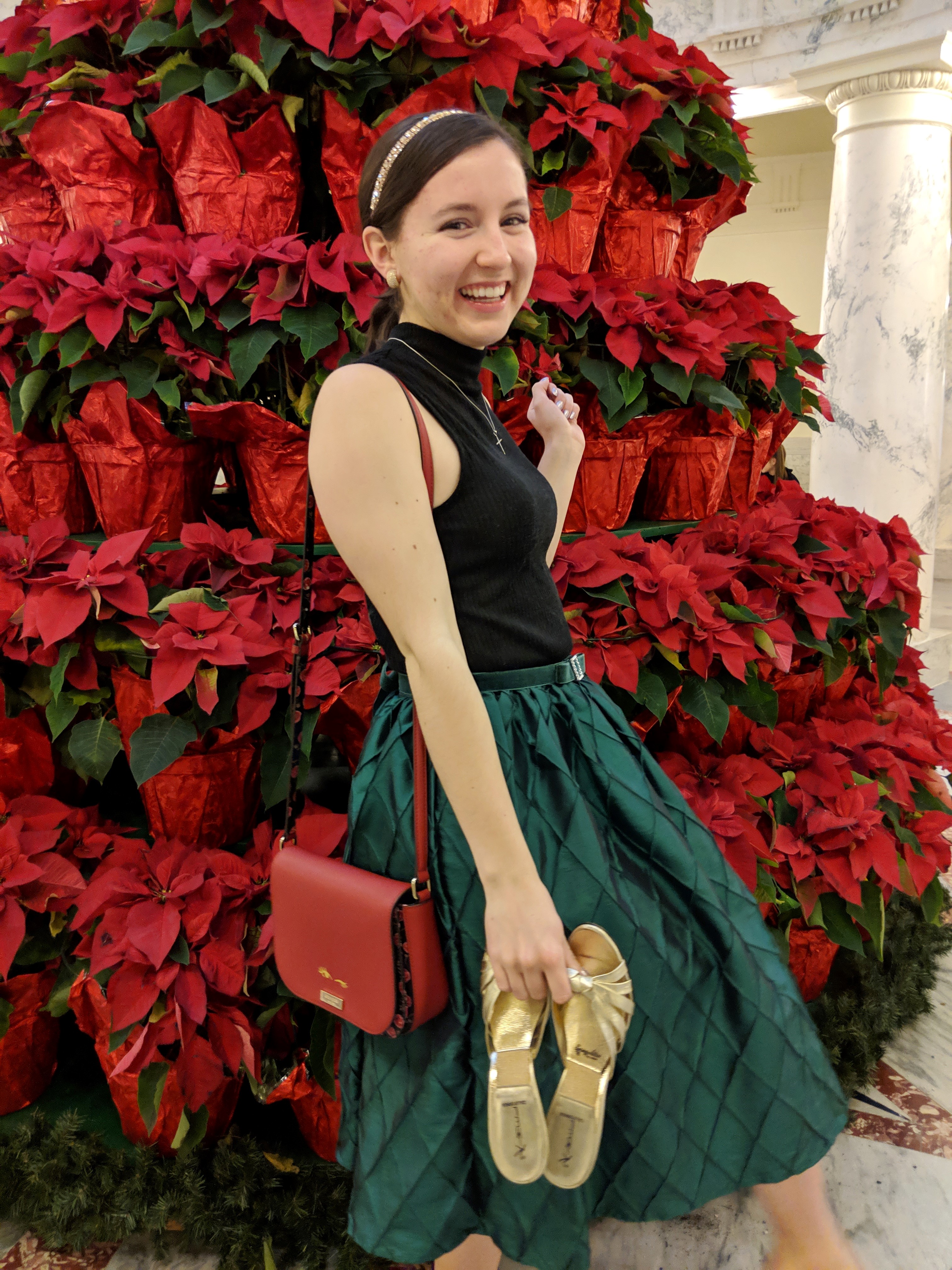 red purse holiday outfit green and black