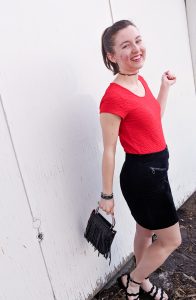 red blouse, black skirt, black sandals