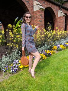University of Puget Sound, spring flowers, blue dress, brown purse