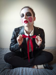 red bowtie, red lipstick, Saw costume