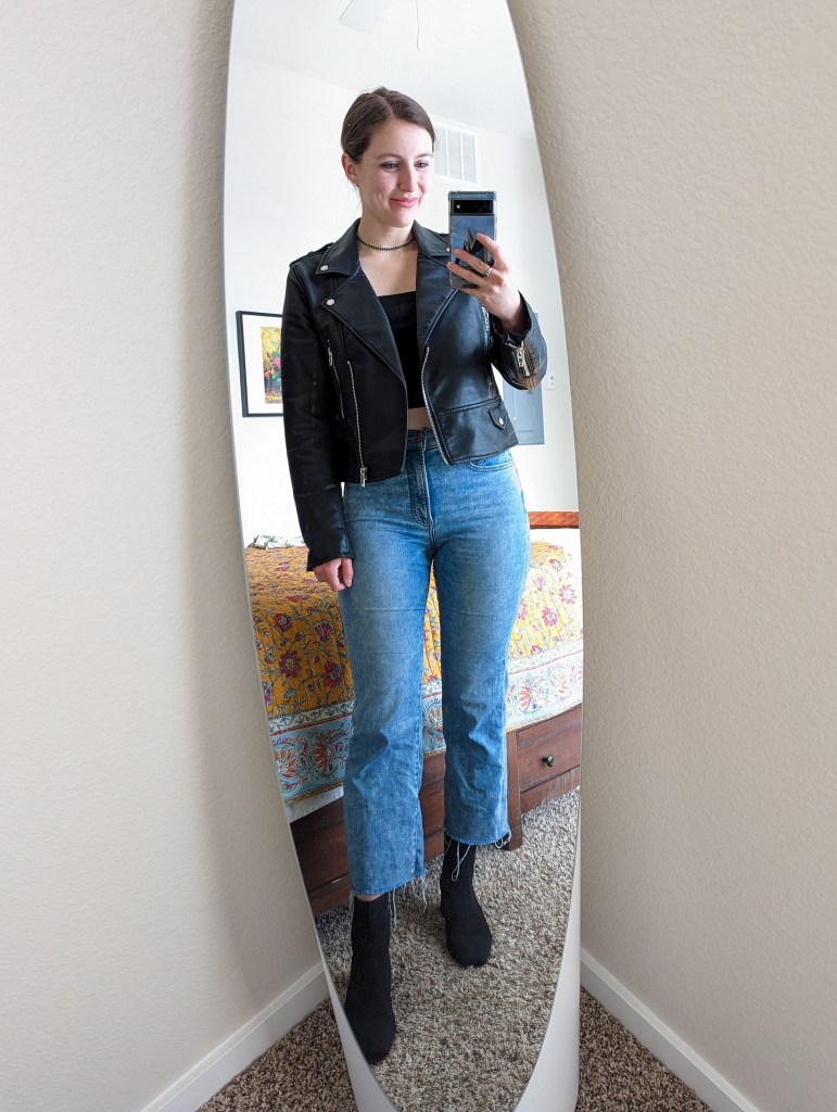 black-crop-top-leather-jacket-cropped-flared-jeans-vivaia-booties