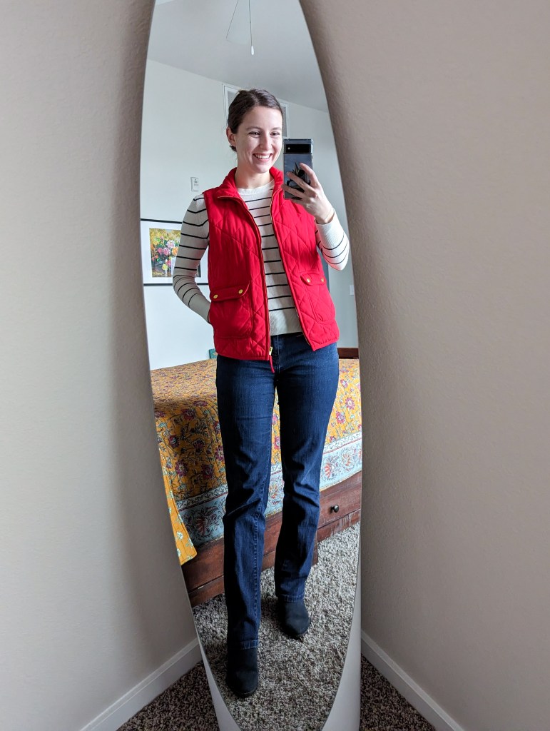 striped-sweater-red-vest-straight-leg-jeans