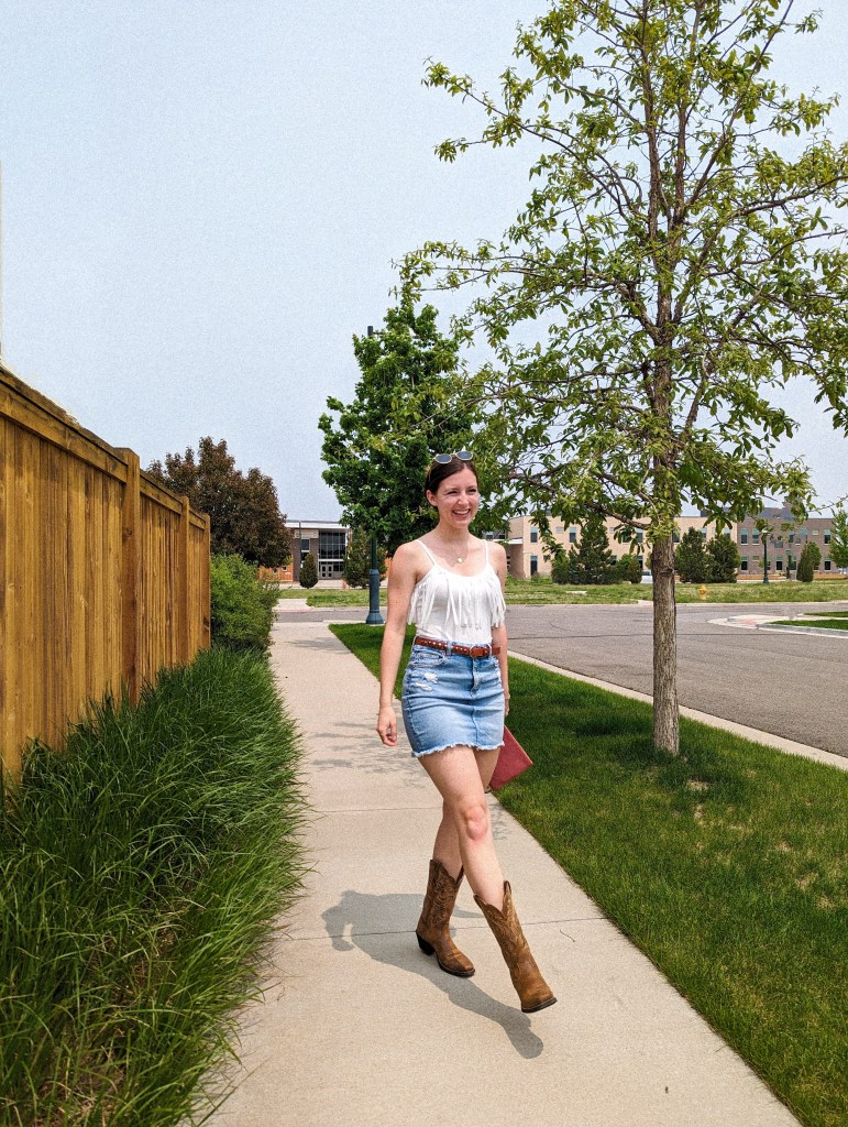 western-style-summer-outfit-boot-barn-cowgirl-boots-denim-skirt-fringe-bodysuit-cavenders