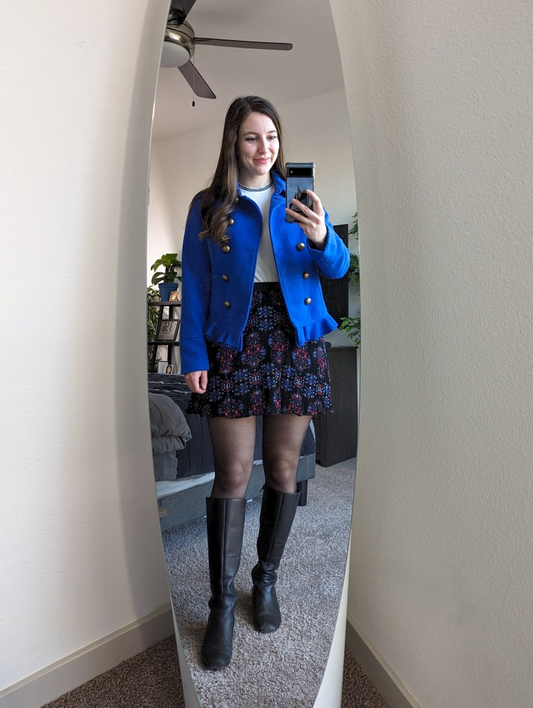 white-sweater-blue-peacoat-patterned-skirt-black-knee-boots