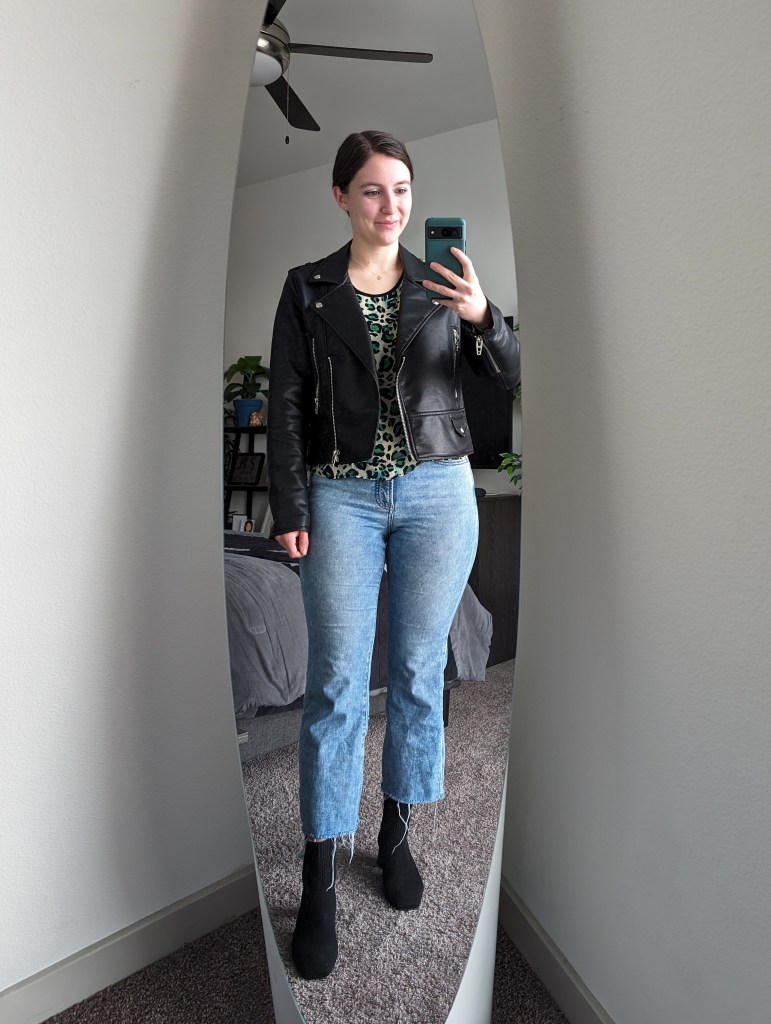 green-leopard-blouse-cabi-black-leather-jacket-cropped-flared-jeans-black-booties