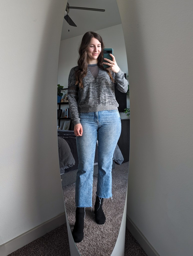 grey-sweatshirt-cropped-flared-jeans-black-booties-vivaia